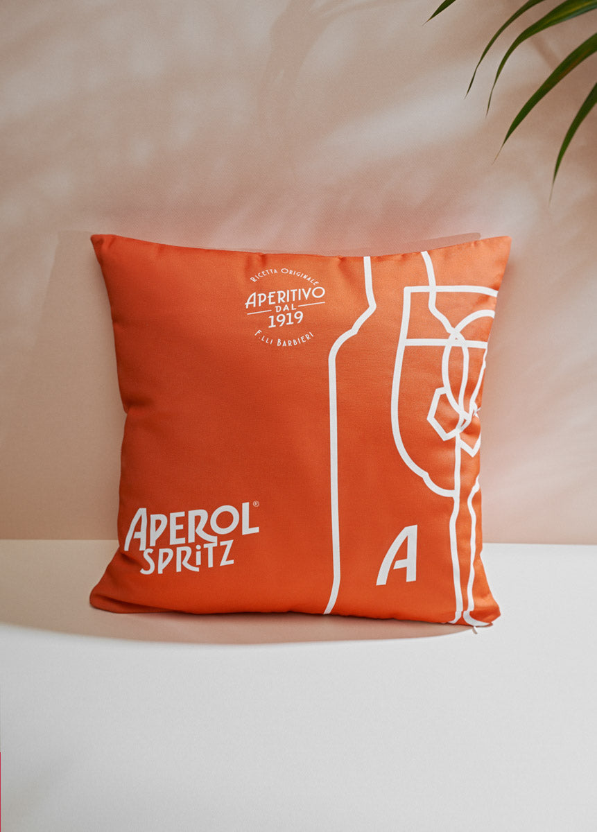 "Verre Aperol Spritz" coussin orange/blanc Aperol Spritz